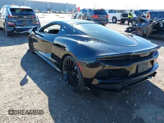 2020 McLaren GT with VIN SBM22GCA1LW000498, listed as a IAAI auction lot 41265247 with 18,465 mi miles. Bid and sale history available at carsss.com. Image 3.