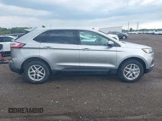2022 Ford Edge SEL с VIN 2FMPK4J99NBB16148, выставлен на аукционе IAAI как лот 42554476 с пробегом 21 572 миль миль и . История ставок и продаж доступна на DreamBid. Изображение 13.