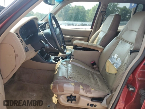 2000 Ford Explorer XLT with VIN 1FMZU73E4YZA72348, listed as a Copart auction lot 59015585 with 182,606 mi miles and Salvage title. Bid and sale history available at DreamBid. Image 7.