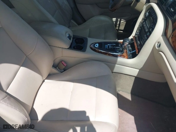 2004 Jaguar XJ with VIN SAJWA73BX4TG14270, listed as a IAAI auction lot 41905325 with 104908 miles. Bid and sale history available at carsss.com. Image 5.