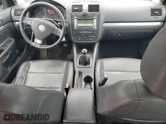 2009 Volkswagen Jetta SE with VIN 3VWRZ71K59M055735, listed as a Copart auction lot 60202485 with 160,196 mi miles and Salvage title. Bid and sale history available at DreamBid. Image 8.