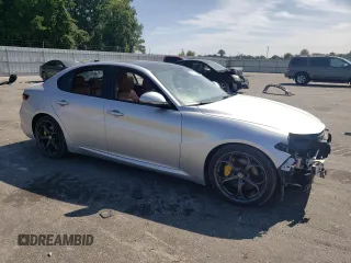2018 Alfa Romeo Giulia Ti Sport with VIN ZARFAECN7J7571981, listed as a Copart auction lot 68208114 with 142,729 mi miles and Salvage Title. Bid and sale history available at carsss.com. Image 4.