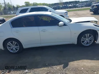2015 Infiniti Q40 with VIN JN1CV6AP5FM502634, listed as a IAAI auction lot 42086833 with 82,909 mi miles and . Bid and sale history available at DreamBid. Image 13.