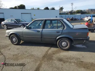 1989 BMW 3 Series 325i with VIN WBAAD2307K8849902, listed as a Copart auction lot 87257434 with 233,562 mi miles and Salvage Title. Bid and sale history available at carsss.com. Image 2.