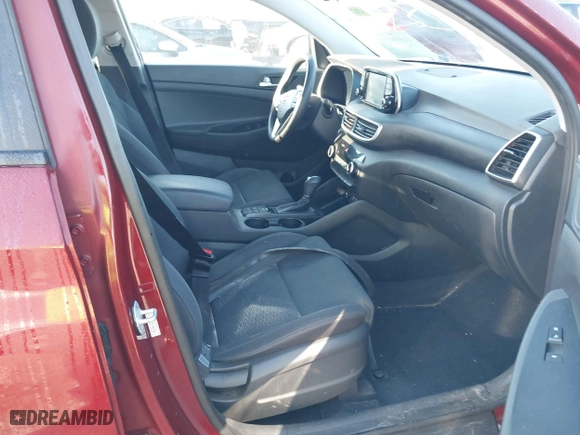 2019 Hyundai Tucson Value with VIN KM8J33A47KU965296, listed as a IAAI auction lot 41506957 with 67,410 mi miles. Bid and sale history available at carsss.com. Image 5.