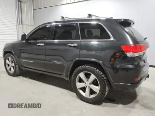 2014 Jeep Grand Cherokee Overland with VIN 1C4RJFCGXEC153250, listed as a Copart auction lot 51327195 with 132,282 mi miles and Clean Title. Bid and sale history available at DreamBid. Image 2.