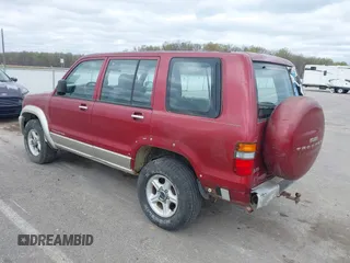 1999 Isuzu Trooper S with VIN JACDJ58X8X7920942, listed as a IAAI auction lot 42029335 with 164,186 mi miles and . Bid and sale history available at DreamBid. Image 3.