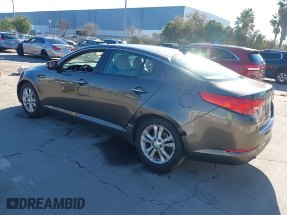 2013 Kia Optima LX with VIN 5XXGM4A74DG114626, listed as a IAAI auction lot 41349903 with 126,856 mi miles. Bid and sale history available at carsss.com. Image 3.