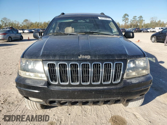 2002 Jeep Grand Cherokee Limited z VIN 1J8GW58SX2C286904, wystawiony jako Copart lot #84749214 z przebiegiem Nie podano mil oraz Czysty tytuł • Clean title. Historia ofert i sprzedaży dostępna na DreamBid. Obrazek 5.
