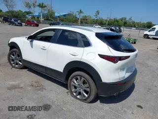 2024 Mazda CX-30 S Carbon Edition with VIN 3MVDMBCM2RM719131, listed as a IAAI auction lot 42265739 with 8,470 mi miles and . Bid and sale history available at DreamBid. Image 3.