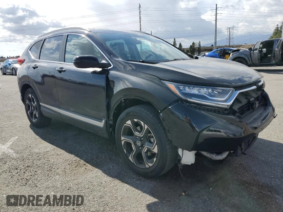 2017 Honda CR-V Touring with VIN 2HKRW1H99HH515480, listed as a Copart auction lot 51869635 with 24,393 mi miles and Salvage Title. Bid and sale history available at carsss.com. Image 4.