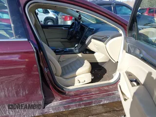 2013 Ford Fusion SE Hybrid z VIN 3FA6P0LU1DR251738, wystawiony jako IAAI lot #41576698 z przebiegiem 158 735 mil mil oraz . Historia ofert i sprzedaży dostępna na DreamBid. Obrazek 5.