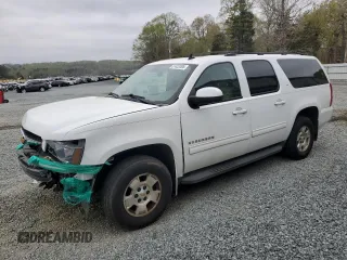 2012 Chevrolet Suburban LT with VIN 1GNSKJE72CR122400, listed as a Copart auction lot 51433395 with 127,596 mi miles and Salvage Title. Bid and sale history available at carsss.com. Image 1.