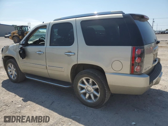 2013 GMC Yukon Denali with VIN 1GKS2EEF0DR168563, listed as a Copart auction lot 67732684 with 124,655 mi miles and Salvage Title. Bid and sale history available at carsss.com. Image 2.