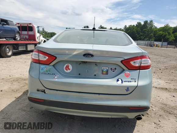 2013 Ford Fusion SE Hybrid with VIN 3FA6P0LU2DR308271, listed as a Copart auction lot 62965605 with 243,414 mi miles and Clean title. Bid and sale history available at DreamBid. Image 6.