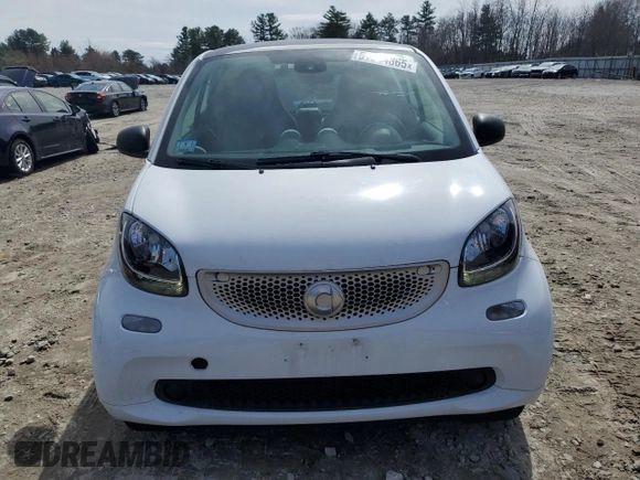 2016 Smart fortwo Passion z VIN WMEFJ5DAXGK123943, wystawiony jako Copart lot #51904865 z przebiegiem 69 821 mil mil oraz Szkody całkowita. Historia ofert i sprzedaży dostępna na DreamBid. Obrazek 5.