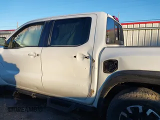 2022 Nissan Frontier SV with VIN 1N6ED1EJ6NN610123, listed as a IAAI auction lot 41261773 with 64,812 mi miles and . Bid and sale history available at DreamBid. Image 14.