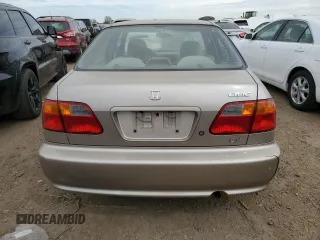 2000 Honda Civic LX with VIN 1HGEJ6677YL043935, listed as a Copart auction lot 56601325 with 163,195 mi miles and Clean Title. Bid and sale history available at DreamBid. Image 6.