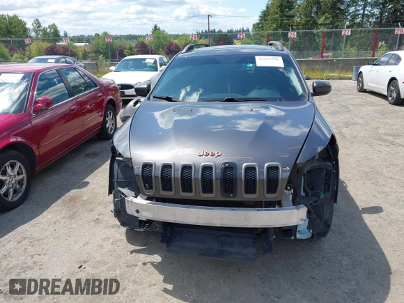 2016 Jeep Cherokee Latitude z VIN 1C4PJMCB9GW293047, wystawiony jako IAAI lot #42325392 z przebiegiem 127 706 mil mil oraz . Historia ofert i sprzedaży dostępna na DreamBid. Obrazek 13.