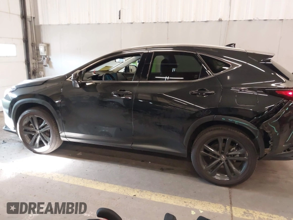 2022 Lexus NX 450h+ Luxury z VIN JTJHKCFZ7N2003572, wystawiony jako IAAI lot #42101154 z przebiegiem 34 455 mil mil oraz . Historia ofert i sprzedaży dostępna na DreamBid. Obrazek 14.