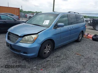 2007 Honda Odyssey EX z VIN 5FNRL38467B087065, wystawiony jako IAAI lot #42204370 z przebiegiem 242 844 mil mil oraz . Historia ofert i sprzedaży dostępna na DreamBid. Obrazek 2.