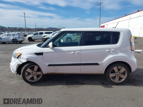 2011 Kia Soul + with VIN KNDJT2A23B7267442, listed as a IAAI auction lot 41671119 with 123,577 mi miles. Bid and sale history available at carsss.com. Image 14.