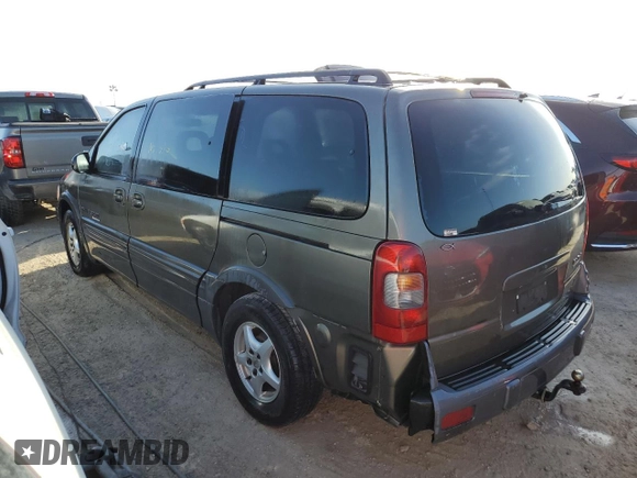 1998 Pontiac Montana z VIN 1GMDX03EXWD344453, wystawiony jako Copart lot #77226424 z przebiegiem Nie podano mil oraz Szkoda całkowita • Salvage title. Historia ofert i sprzedaży dostępna na DreamBid. Obrazek 2.