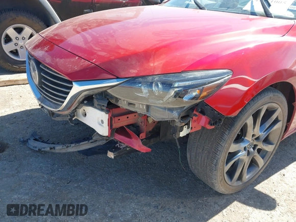 2017 Mazda 6 Grand Touring with VIN JM1GL1W52H1139776, listed as a IAAI auction lot 41671005 with 40,884 mi miles and . Bid and sale history available at DreamBid. Image 6.