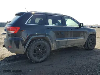 2011 Jeep Grand Cherokee Laredo with VIN 1J4RR4GG4BC624399, listed as a Copart auction lot 52796525 with 242,317 mi miles and Clean Title. Bid and sale history available at carsss.com. Image 3.
