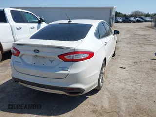 2013 Ford Fusion Titanium with VIN 3FA6P0K96DR303345, listed as a IAAI auction lot 41921106 with 131,732 mi miles. Bid and sale history available at carsss.com. Image 4.