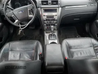 2012 Ford Fusion SEL z VIN 3FAHP0JA3CR156338, wystawiony jako Copart lot #51996885 z przebiegiem 162 892 mil mil oraz Szkoda całkowita • Salvage title. Historia ofert i sprzedaży dostępna na DreamBid. Obrazek 8.