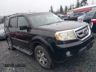 2011 Honda Pilot Touring z VIN 5FNYF4H9XBB081332, wystawiony jako IAAI lot #41251929 z przebiegiem 203 563 mil mil oraz . Historia ofert i sprzedaży dostępna na DreamBid. Obrazek 1.