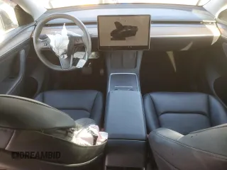 2024 Tesla Model Y with VIN 7SAYGDED7RF056973, listed as a Copart auction lot 87139214 with 15,391 mi miles and Salvage Title. Bid and sale history available at DreamBid. Image 8.