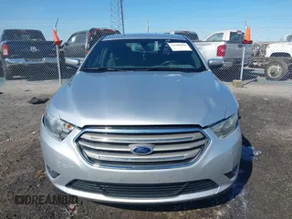 2013 Ford Taurus SEL with VIN 1FAHP2E8XDG164903, listed as a IAAI auction lot 41580690 with 163,128 mi miles and . Bid and sale history available at carsss.com. Image 12.