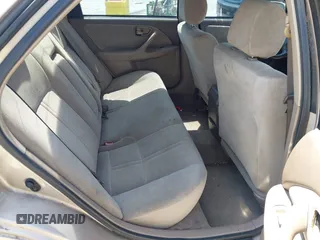 2000 Toyota Camry CE z VIN 4T1BG22K5YU972322, wystawiony jako IAAI lot #42098429 z przebiegiem 122 351 mil mil oraz . Historia ofert i sprzedaży dostępna na DreamBid. Obrazek 8.
