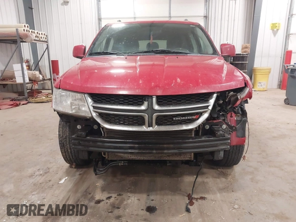 2012 Dodge Journey SXT z VIN 3C4PDDBG4CT397806, wystawiony jako IAAI lot #41333394 z przebiegiem 122 804 mil mil oraz . Historia ofert i sprzedaży dostępna na DreamBid. Obrazek 6.