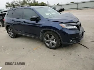 2019 Honda Passport Touring z VIN 5FNYF7H97KB000093, wystawiony jako Copart lot #78888424 z przebiegiem 41 742 mil mil oraz Szkoda całkowita • Salvage title. Historia ofert i sprzedaży dostępna na DreamBid. Obrazek 11.