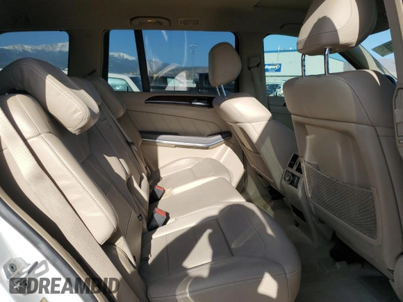 2014 Mercedes-Benz GL 450 z VIN 4JGDF7CE0EA395164, wystawiony jako Copart lot #51081185 z przebiegiem 92 321 mil mil oraz Szkody całkowita. Historia ofert i sprzedaży dostępna na DreamBid. Obrazek 12.