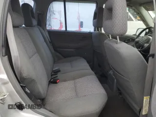2002 Chevrolet Tracker z VIN 2CNBE13C926934704, wystawiony jako Copart lot #70717194 z przebiegiem 189 076 mil mil oraz Szkody całkowita. Historia ofert i sprzedaży dostępna na DreamBid. Obrazek 10.