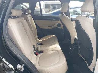 2018 BMW X1 sDrive28i with VIN WBXHU7C39J5L07129, listed as a IAAI auction lot 41472014 with 56,486 mi miles. Bid and sale history available at carsss.com. Image 8.
