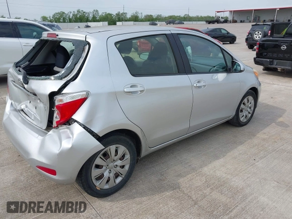 2013 Toyota Yaris L with VIN JTDKTUD32DD542761, listed as a IAAI auction lot 41969533 with 123,281 mi miles. Bid and sale history available at carsss.com. Image 4.