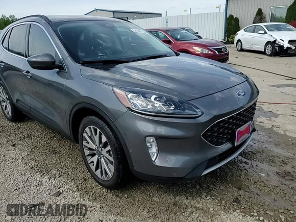 2021 Ford Escape Titanium Hybrid z VIN 1FMCU9DZ4MUA56645, wystawiony jako Copart lot #54059515 z przebiegiem 31 432 mil mil oraz Szkoda całkowita • Salvage title. Historia ofert i sprzedaży dostępna na DreamBid. Obrazek 14.