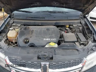 2014 Dodge Journey SXT with VIN 3C4PDCBG1ET127798, listed as a IAAI auction lot 41799898 with 178,873 mi miles and . Bid and sale history available at DreamBid. Image 10.