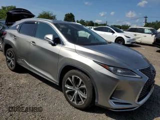 2021 Lexus RX 450h with VIN 2T2HGMDA6MC066035, listed as a Copart auction lot 65873235 with 51,949 mi miles and Salvage title. Bid and sale history available at DreamBid. Image 4.
