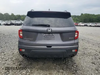 2021 Honda Passport Touring z VIN 5FNYF7H94MB005741, wystawiony jako Copart lot #57626664 z przebiegiem Nie podano mil oraz Szkoda całkowita • Salvage title. Historia ofert i sprzedaży dostępna na DreamBid. Obrazek 6.