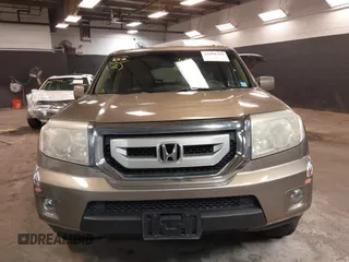 2009 Honda Pilot EX-L with VIN 5FNYF48639B011686, listed as a IAAI auction lot 41958353 with 155,382 mi miles and . Bid and sale history available at carsss.com. Image 12.