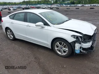 2018 Ford Fusion SE z VIN 3FA6P0HD3JR281666, wystawiony jako IAAI lot #42320876 z przebiegiem 33 407 mil mil oraz . Historia ofert i sprzedaży dostępna na DreamBid. Obrazek 1.