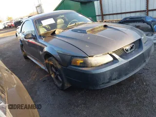 2004 Ford Mustang GT Deluxe z VIN 1FAFP42X64F176082, wystawiony jako IAAI lot #41318476 z przebiegiem 120 827 mil mil oraz . Historia ofert i sprzedaży dostępna na DreamBid. Obrazek 1.