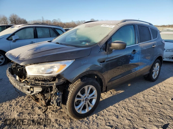 2018 Ford Escape SE z VIN 1FMCU9GD7JUA19262, wystawiony jako Copart lot #84627944 z przebiegiem 89 993 mil mil oraz Szkoda całkowita • Salvage title. Historia ofert i sprzedaży dostępna na DreamBid. Obrazek 1.