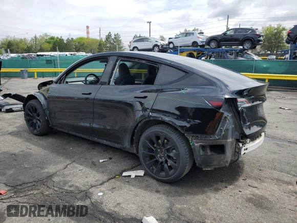 2022 Tesla Model Y Long Range z VIN 7SAYGDEE7NA014402, wystawiony jako Copart lot #56325005 z przebiegiem 41 171 mil mil oraz Szkody całkowita. Historia ofert i sprzedaży dostępna na DreamBid. Obrazek 2.